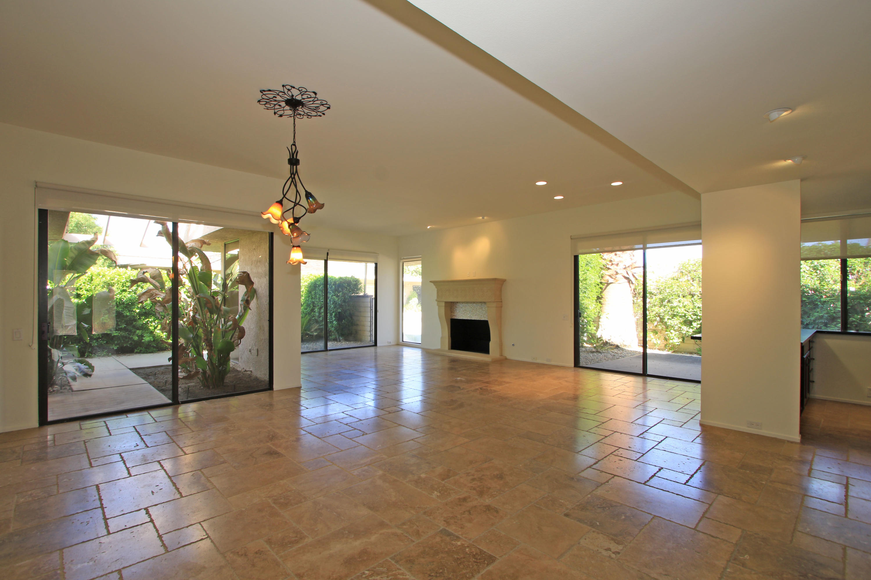 14 Colgate Drive Rancho Mirage, CA 92270 - Photo 21 of 46 a view of a living room a window and a fireplace