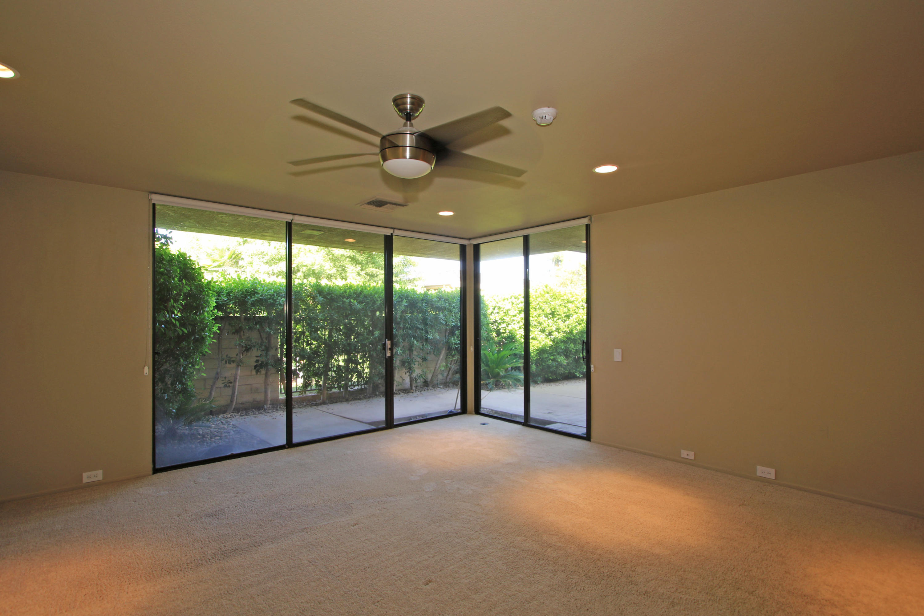 14 Colgate Drive Rancho Mirage, CA 92270 - Photo 24 of 46 a view of an empty room with windows