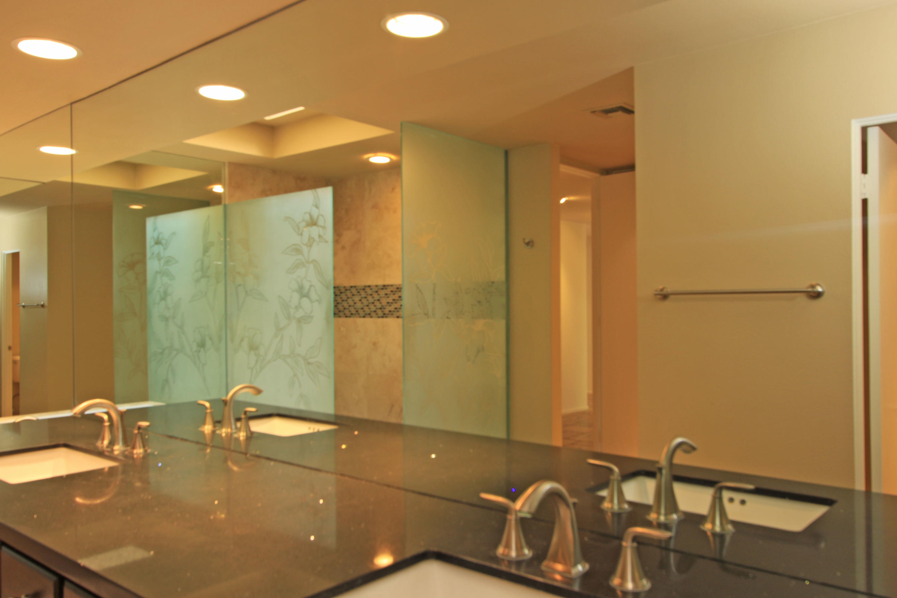 14 Colgate Drive Rancho Mirage, CA 92270 - Photo 26 of 46 a bathroom with a sink and a mirror