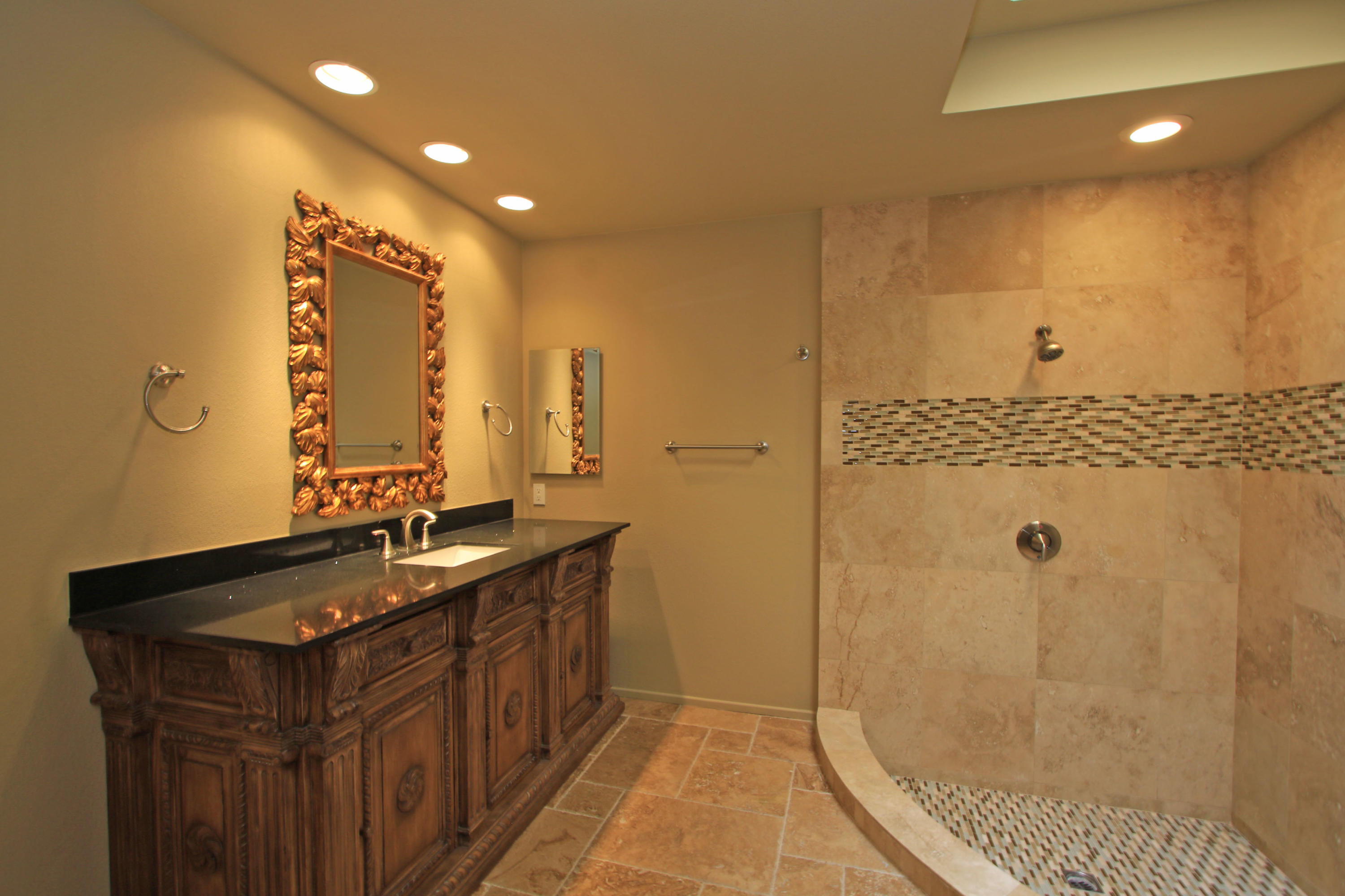14 Colgate Drive Rancho Mirage, CA 92270 - Photo 32 of 46 a bathroom with a double vanity sink a toilet and shower