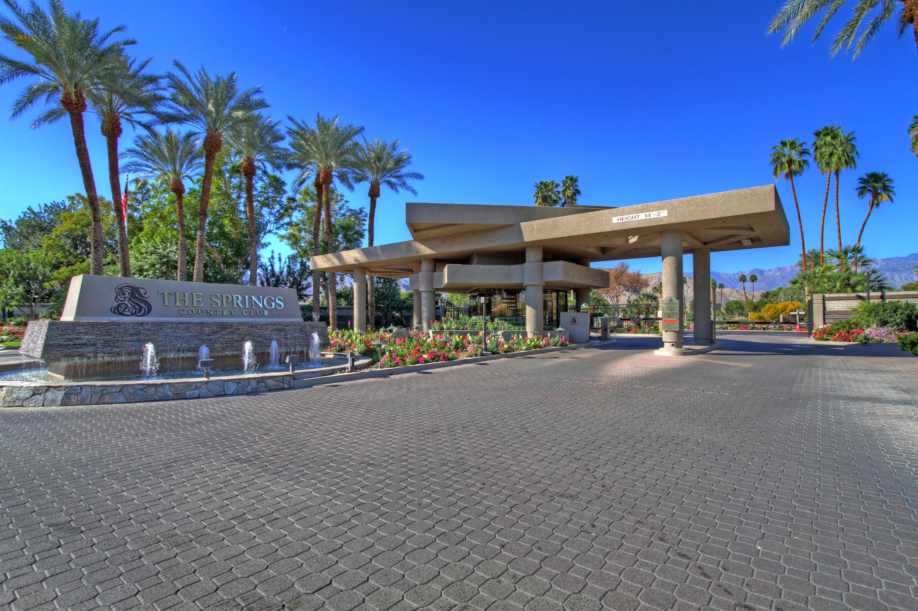 14 Colgate Drive Rancho Mirage, CA 92270 - Photo 46 of 46 a view of the street and a building in the background