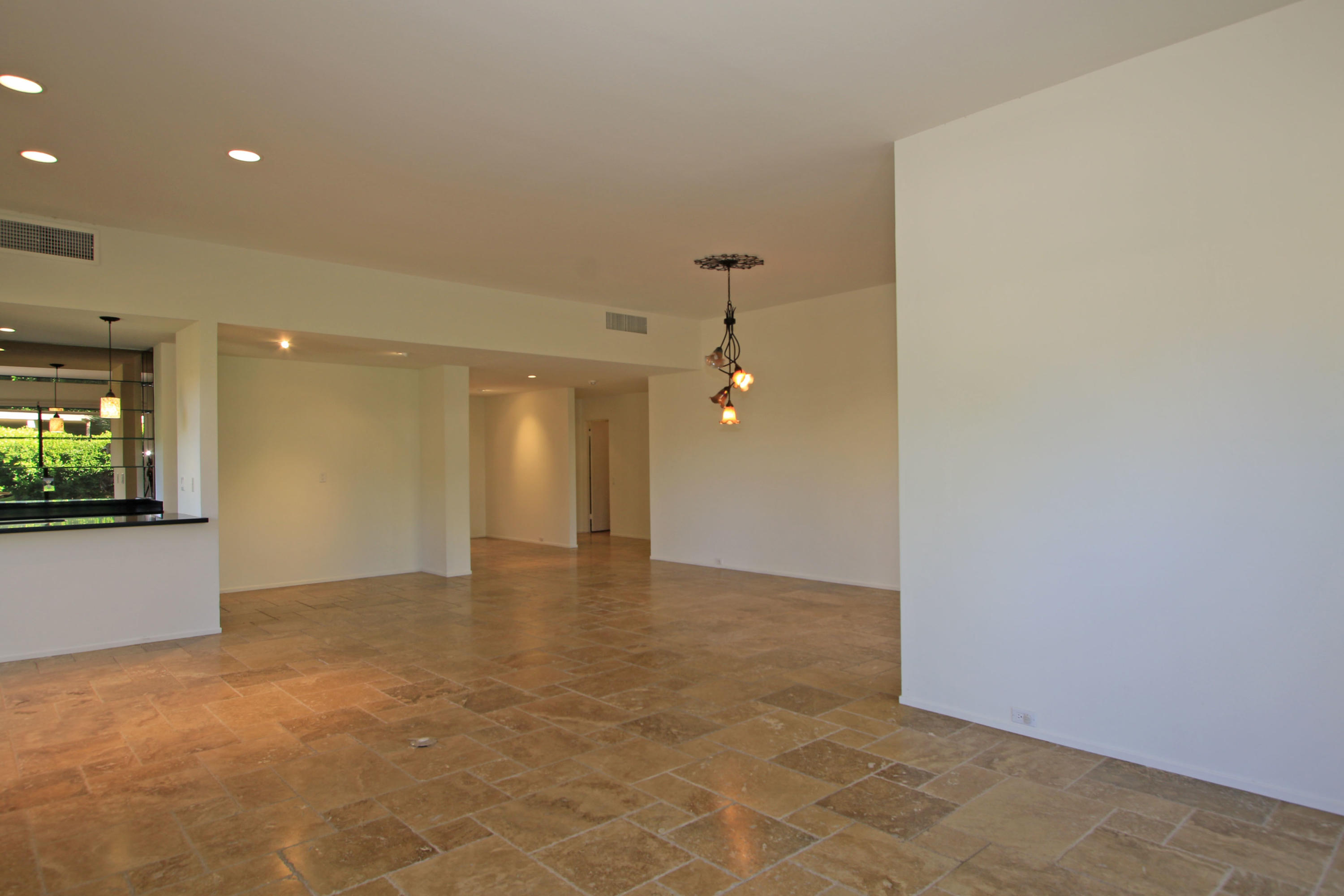14 Colgate Drive Rancho Mirage, CA 92270 - Photo 10 of 46 a view of an empty room with a window