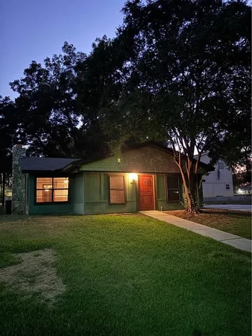 a house view with a garden space