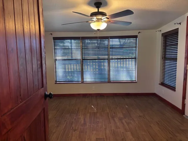 a kitchen with a stove sink and microwave