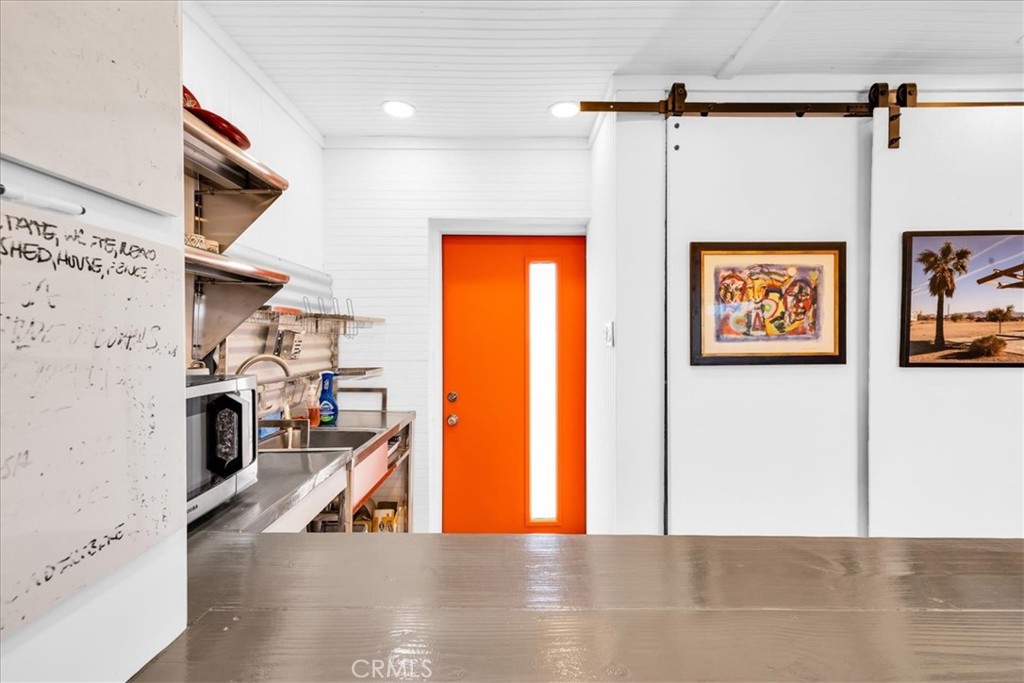 84951 Amboy Road Twentynine Palms, CA 92277 - Photo 13 of 36 a view of a kitchen with furniture and a kitchen
