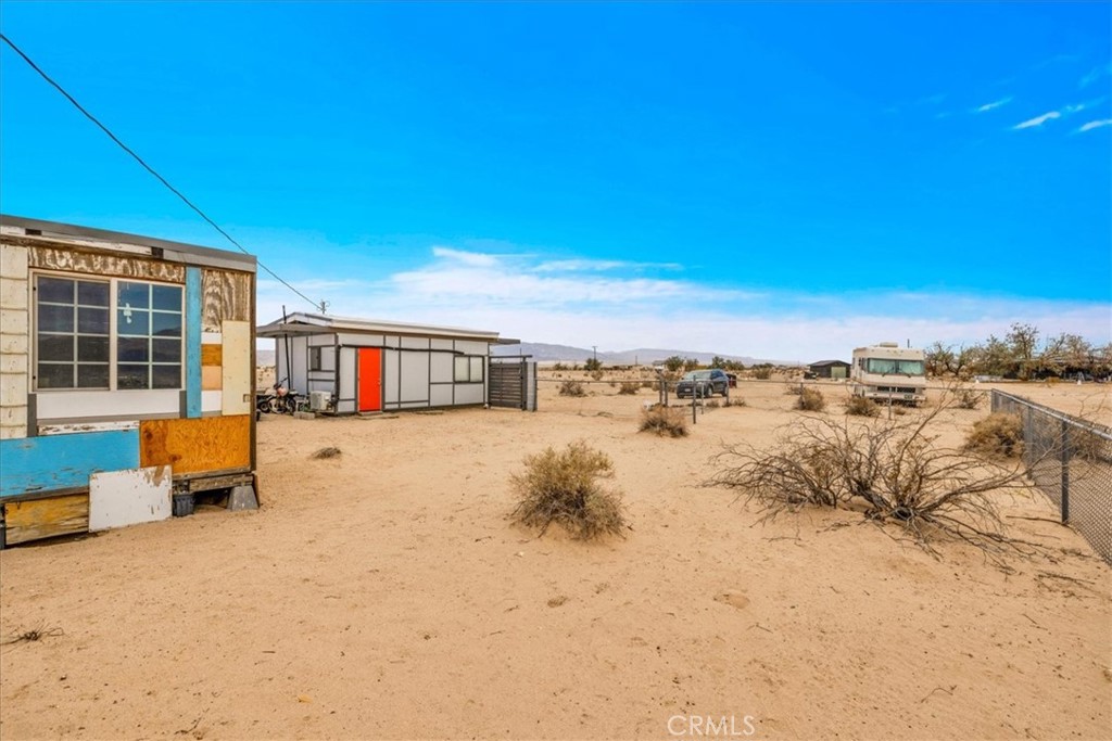 84951 Amboy Road Twentynine Palms, CA 92277 - Photo 20 of 36 a view of a terrace with lawn chairs