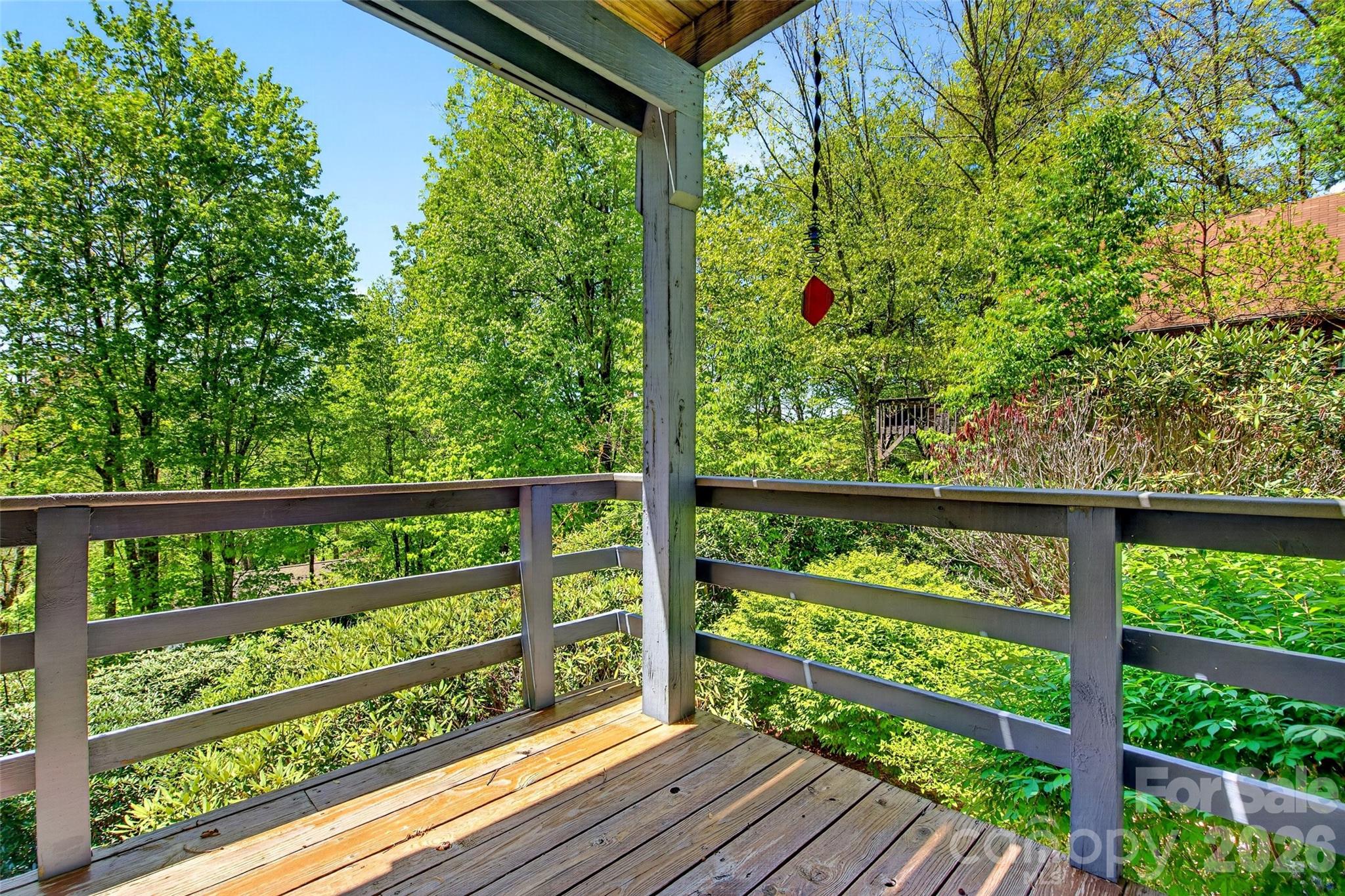 334 Harbor Lake Road Newland, NC 28657 - Photo 30 of 48 a view of balcony with wooden floor
