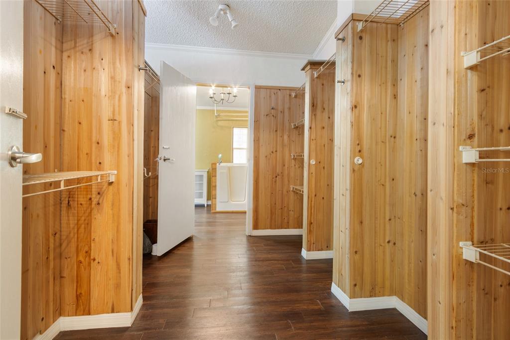 4912 Miley Road Plant City, FL 33565 - Photo 17 of 48 a view of a bathroom with a shower and a mirror
