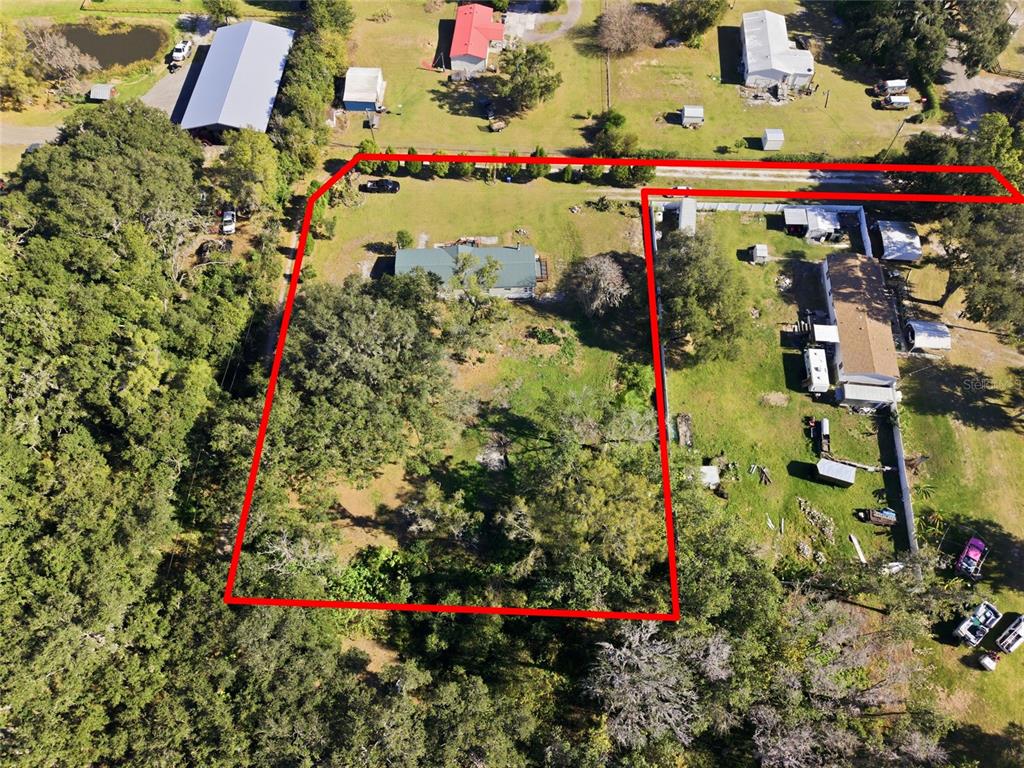 4912 Miley Road Plant City, FL 33565 - Photo 47 of 48 an aerial view of a houses and city street