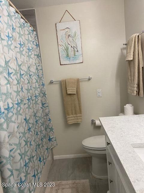 146 Bimini Road Cocoa Beach, FL 32931 - Photo 19 of 37 a bathroom with a toilet and a shower