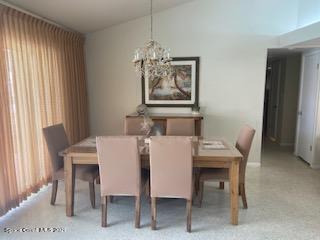146 Bimini Road Cocoa Beach, FL 32931 - Photo 5 of 37 a dining room with furniture and window