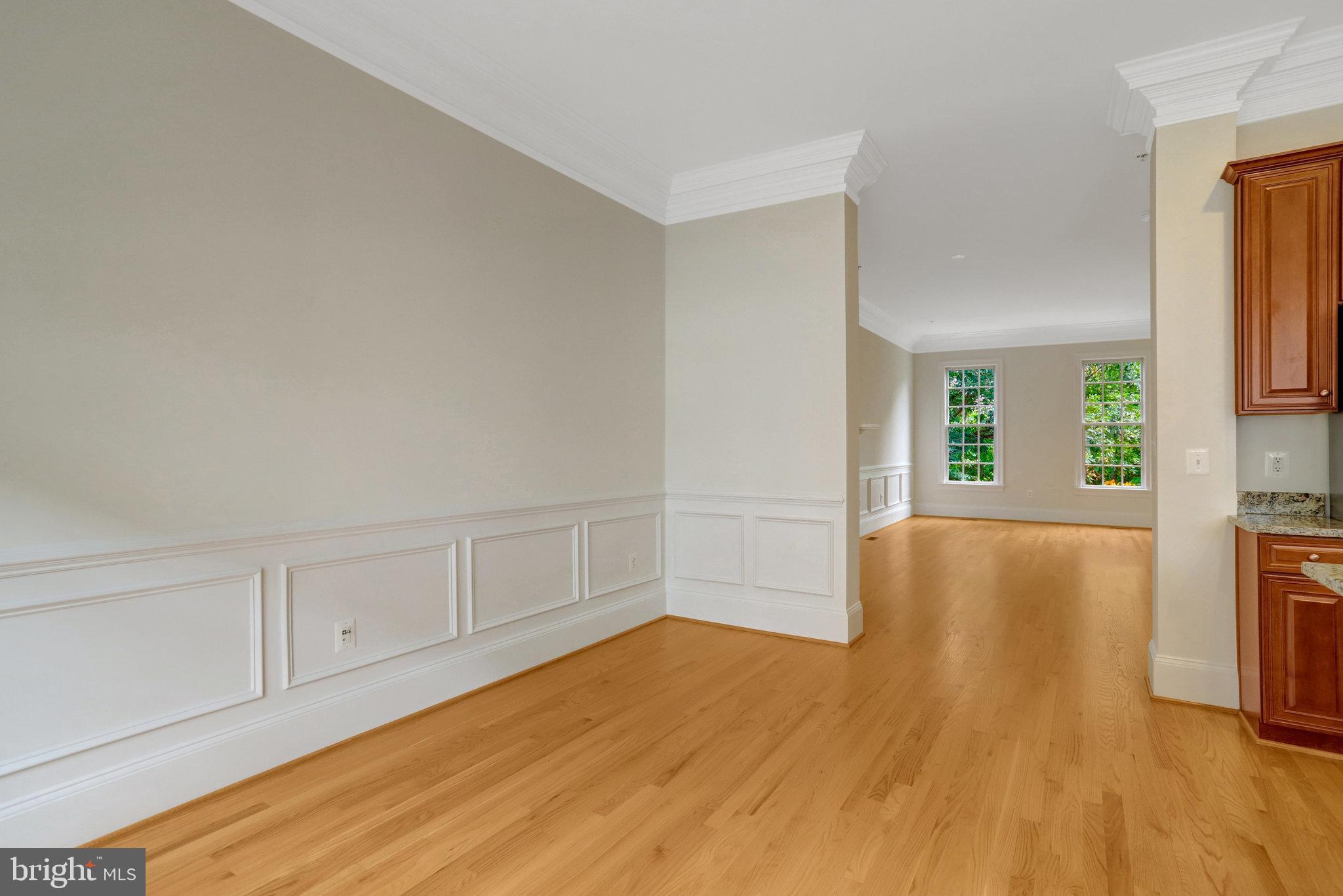 1852 Carpenter Road Alexandria, VA 22314 - Photo 15 of 63 a view of empty room with wooden floor and fan