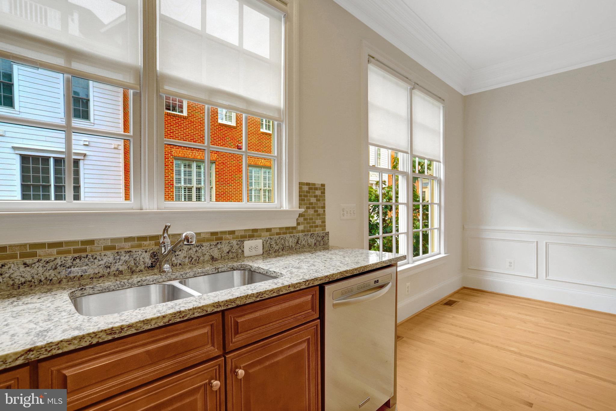 1852 Carpenter Road Alexandria, VA 22314 - Photo 19 of 63 a bathroom with a sink and a window