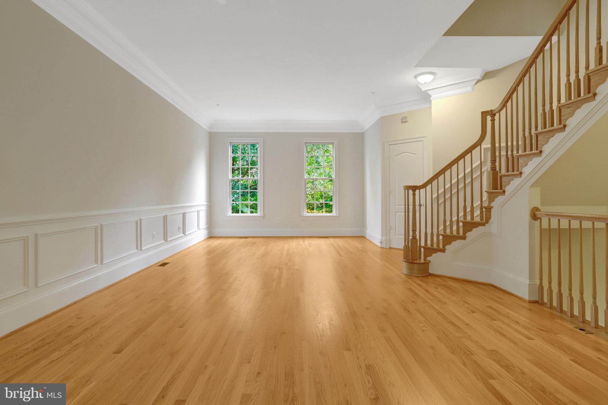 1852 Carpenter Road Alexandria, VA 22314 - Photo 20 of 63 a view of an empty room with wooden floor and a window