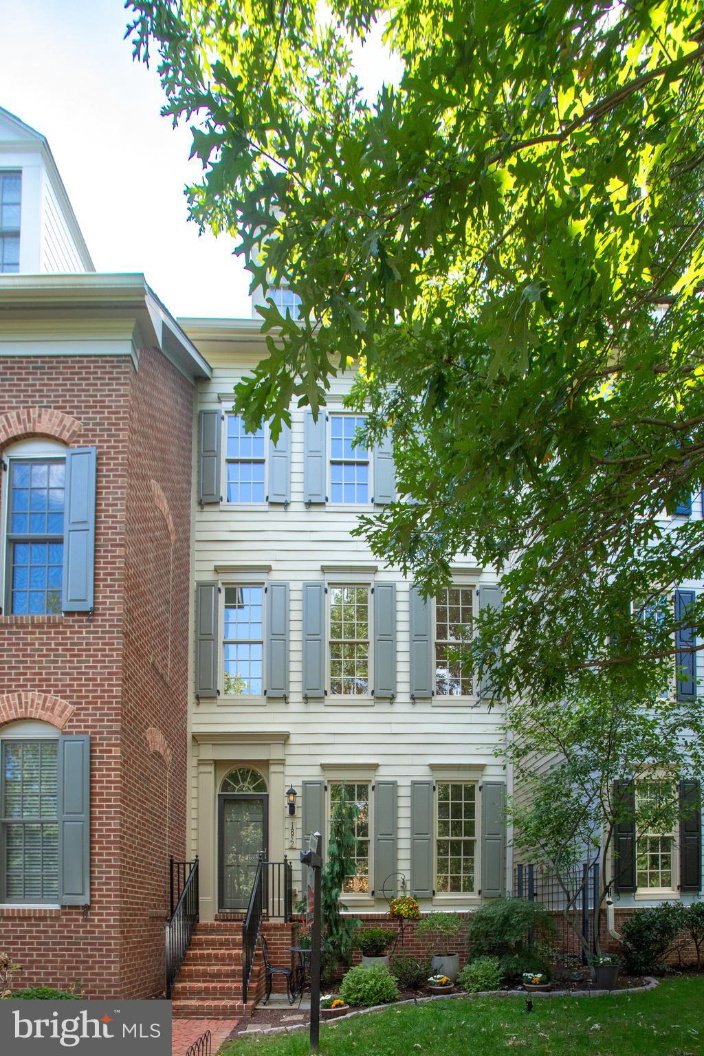 1852 Carpenter Road Alexandria, VA 22314 - Photo 2 of 63 a front view of a house with garden