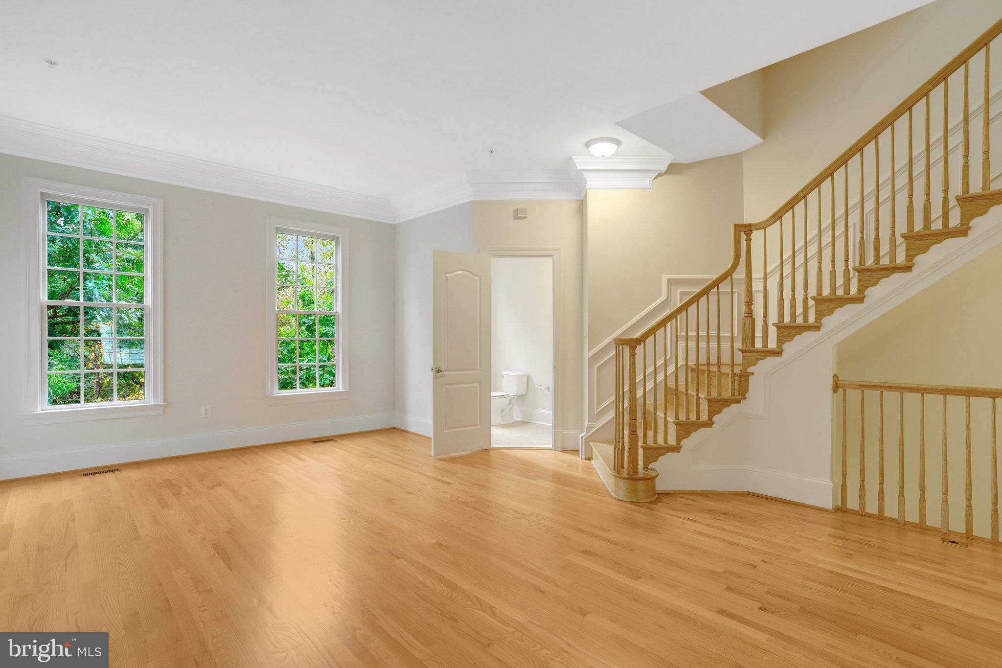 1852 Carpenter Road Alexandria, VA 22314 - Photo 26 of 63 a view of an entryway with wooden floor and windows