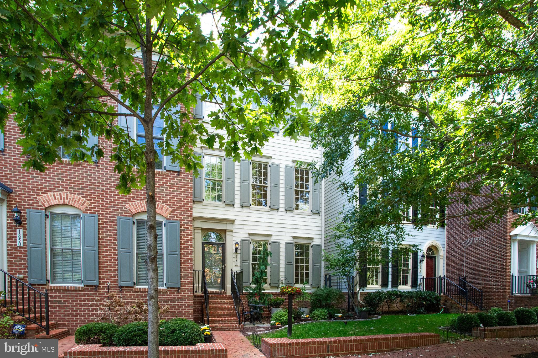 1852 Carpenter Road Alexandria, VA 22314 - Photo 4 of 63 front view of a house with a tree