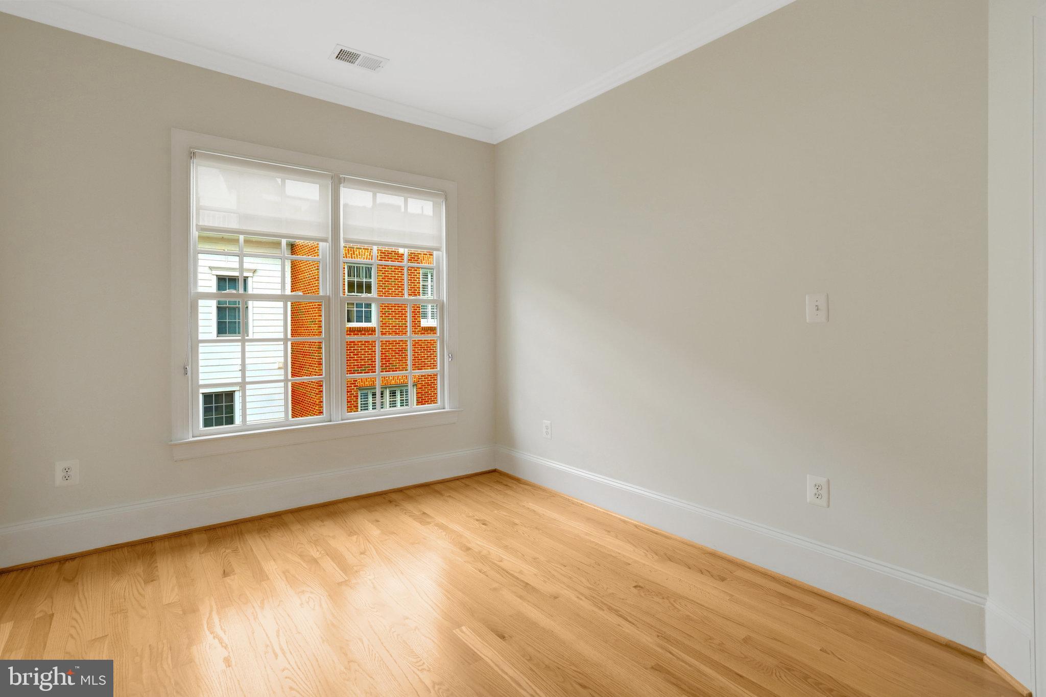 1852 Carpenter Road Alexandria, VA 22314 - Photo 45 of 63 a view of an empty room with a window