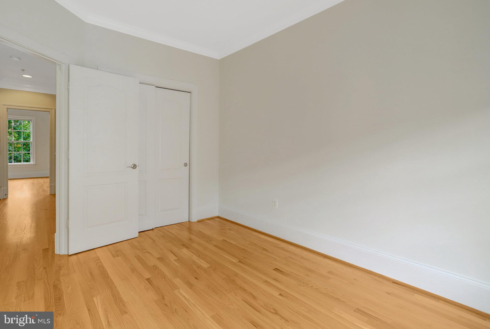 1852 Carpenter Road Alexandria, VA 22314 - Photo 47 of 63 a view of empty room with wooden floor