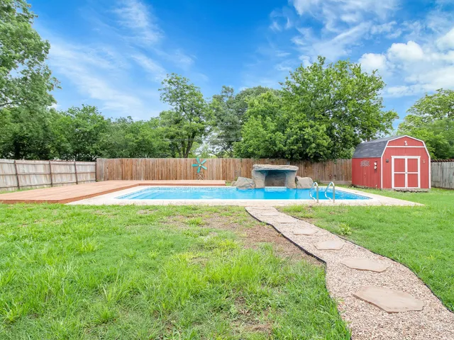 a house view with a garden space