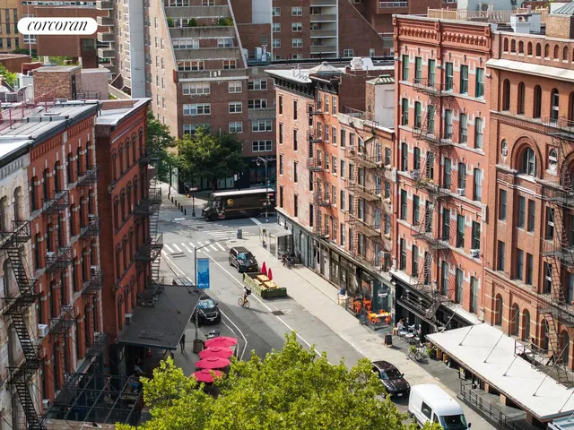 a view of a city with tall buildings