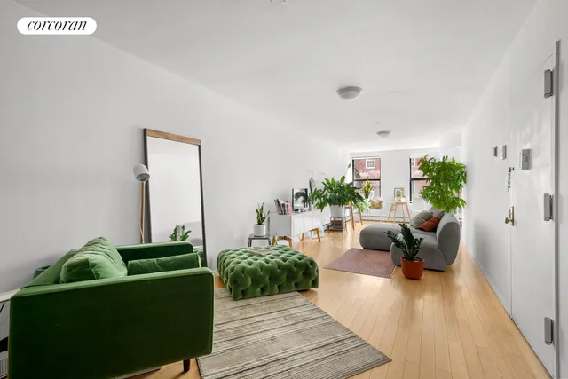 a view of a room with lots of gym equipment