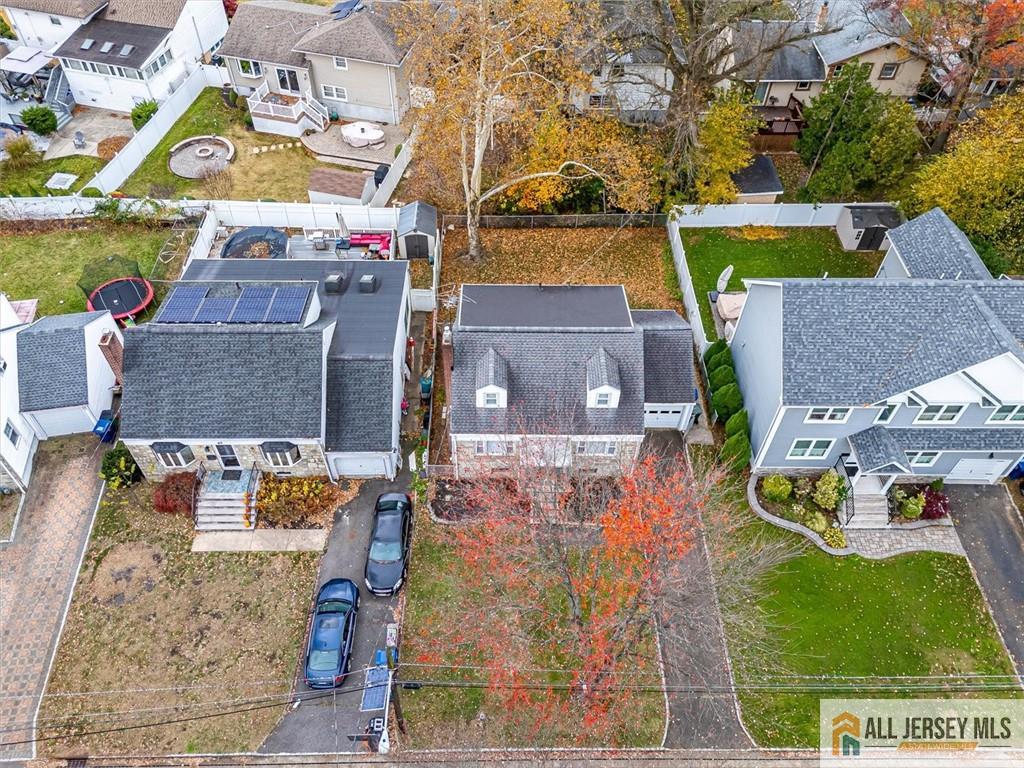 65 Colonial Drive Clark, NJ 07066 - Photo 4 of 44 an aerial view of residential houses with outdoor space