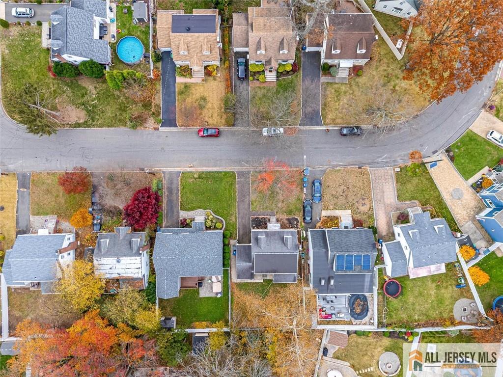 65 Colonial Drive Clark, NJ 07066 - Photo 7 of 44 an aerial view of residential houses with outdoor space and parking