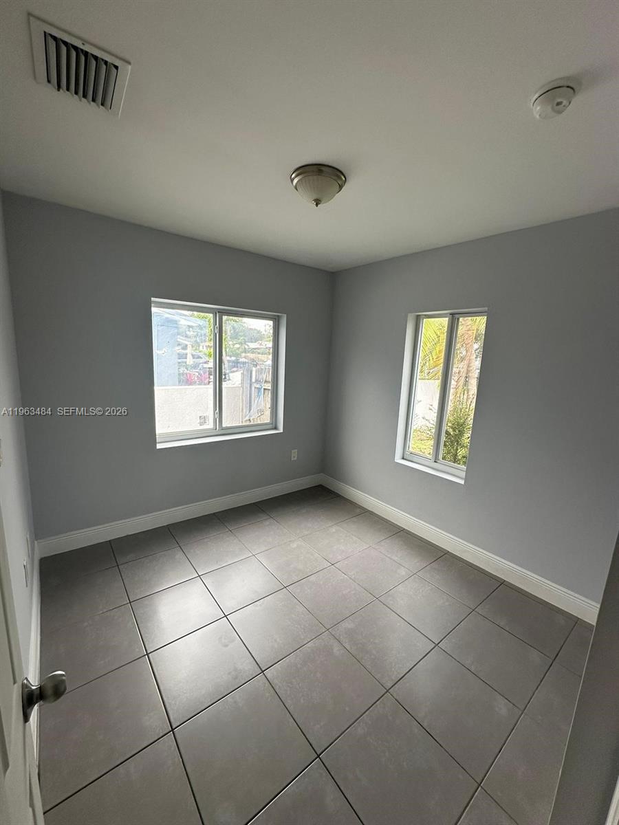 1128 Northwest 101st Street, Unit WEST Miami, FL 33150 - Photo 14 of 16