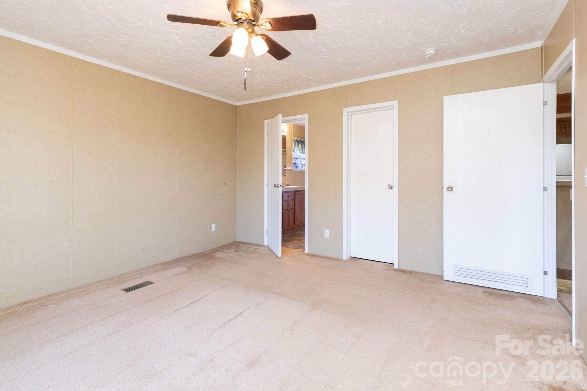 87 Hickory Nut Trace Old Fort, NC 28762 - Photo 14 of 26 a view of an empty room with a window