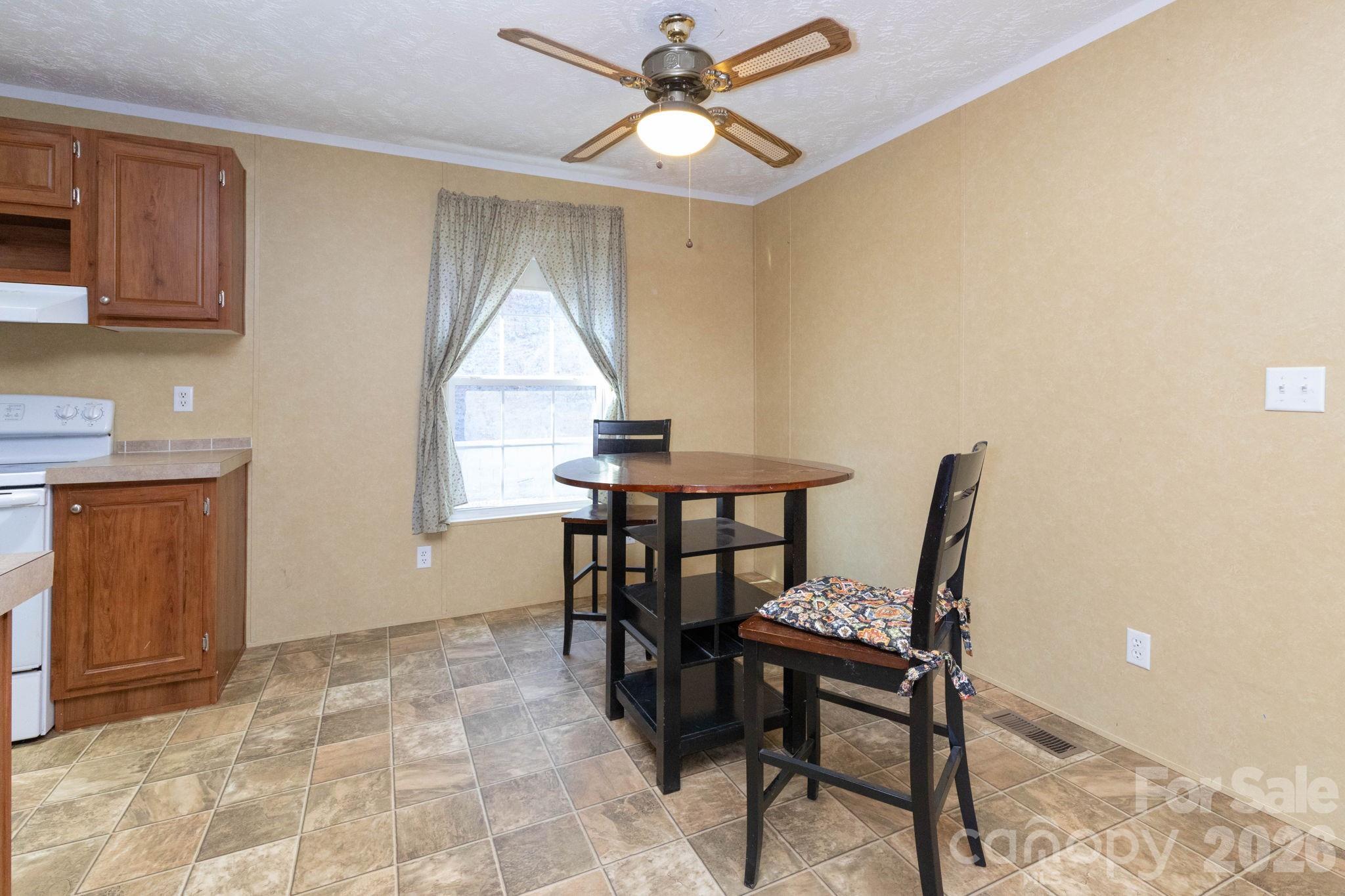 87 Hickory Nut Trace Old Fort, NC 28762 - Photo 16 of 26 a workspace with furniture and window