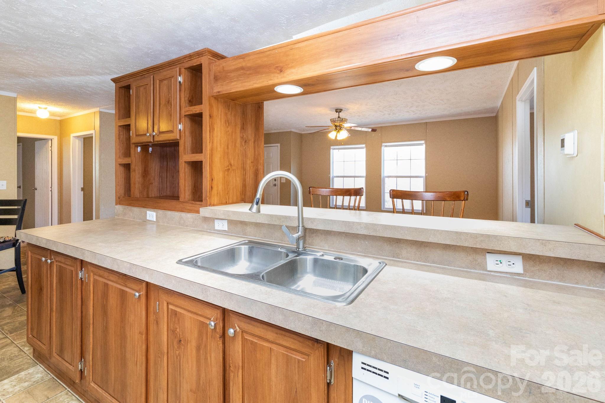 87 Hickory Nut Trace Old Fort, NC 28762 - Photo 17 of 26 a bathroom with a sink and a mirror