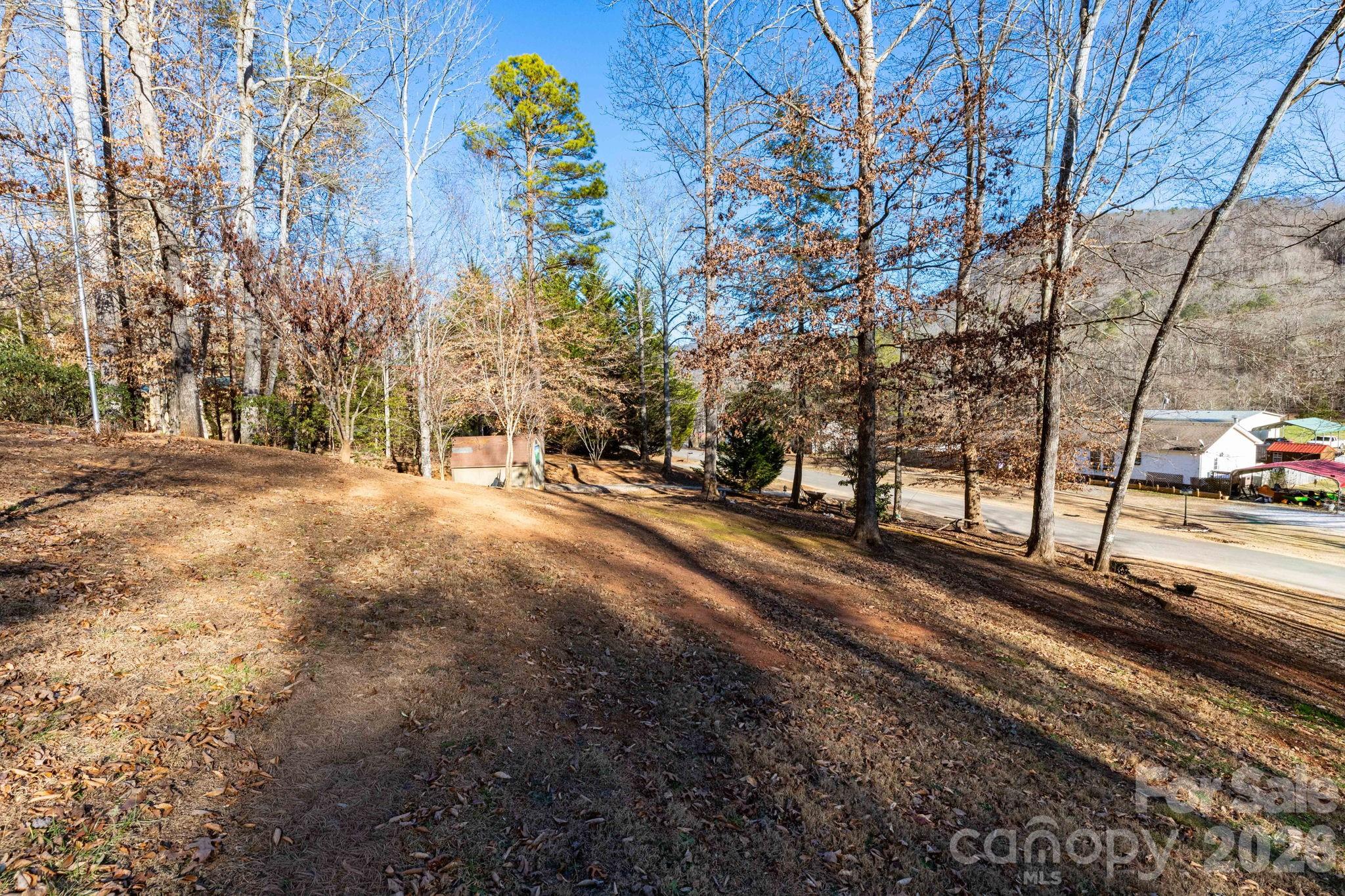 87 Hickory Nut Trace Old Fort, NC 28762 - Photo 22 of 26 a view of a city street with a building