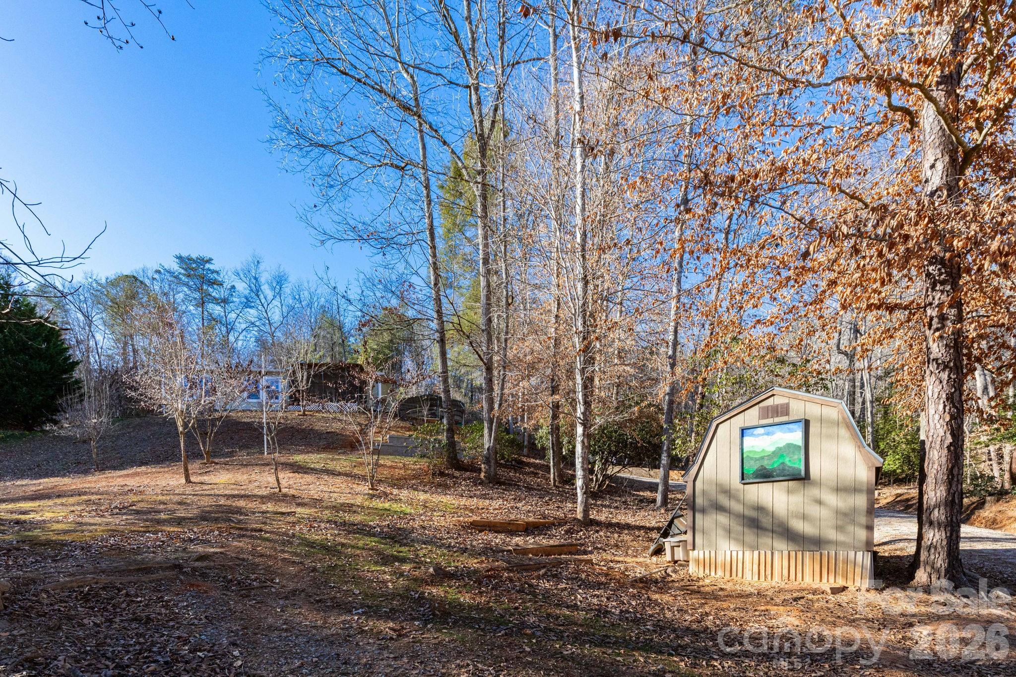 87 Hickory Nut Trace Old Fort, NC 28762 - Photo 23 of 26 a view of a chairs in a backyard