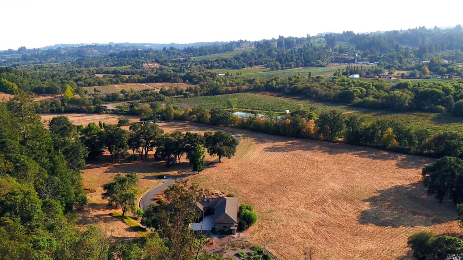 8898 Occidental Road Sebastopol, CA 95472 - Photo 1 of 1 an aerial view of a town with couple of houses
