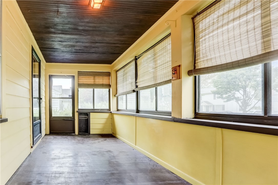 100 Maltby Street Rochester, NY 14606 - Photo 2 of 17 Spacious Enclosed Front Porch
