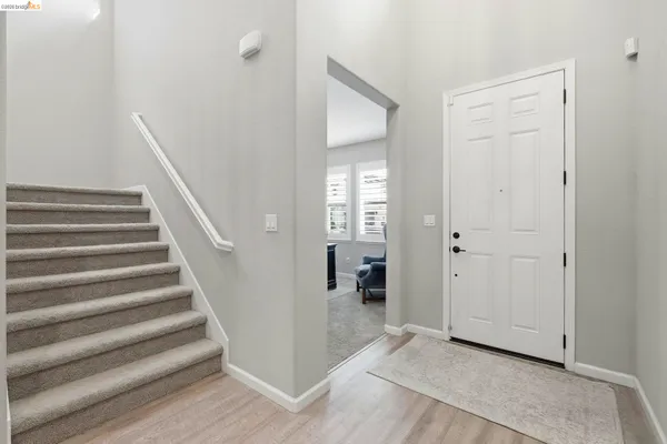 a view of an entryway with staircase