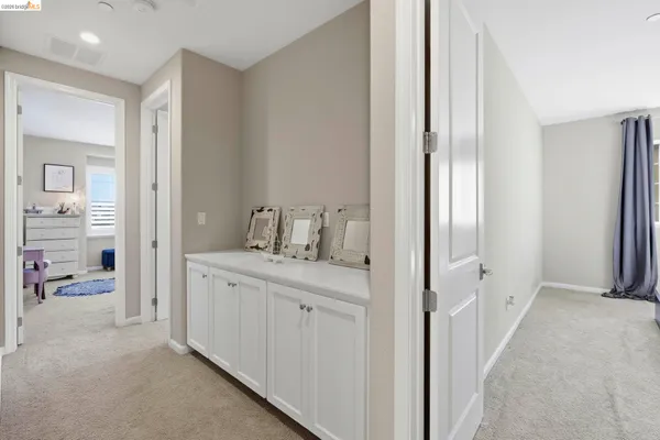 a en suite bathroom with a sink a mirror and a shower