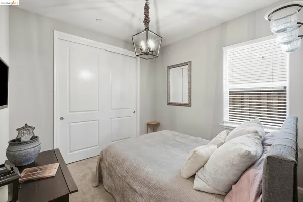 a bedroom with a bed and furniture