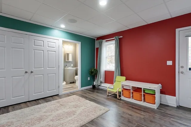 a bathroom with a sink and a window
