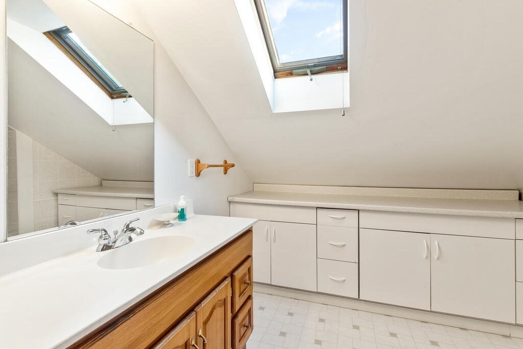 35 Brook Street Wakefield, MA 01880 - Photo 24 of 33 a bathroom with a sink and a mirror