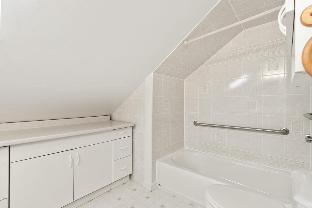 35 Brook Street Wakefield, MA 01880 - Photo 25 of 33 a bathroom with a bathtub