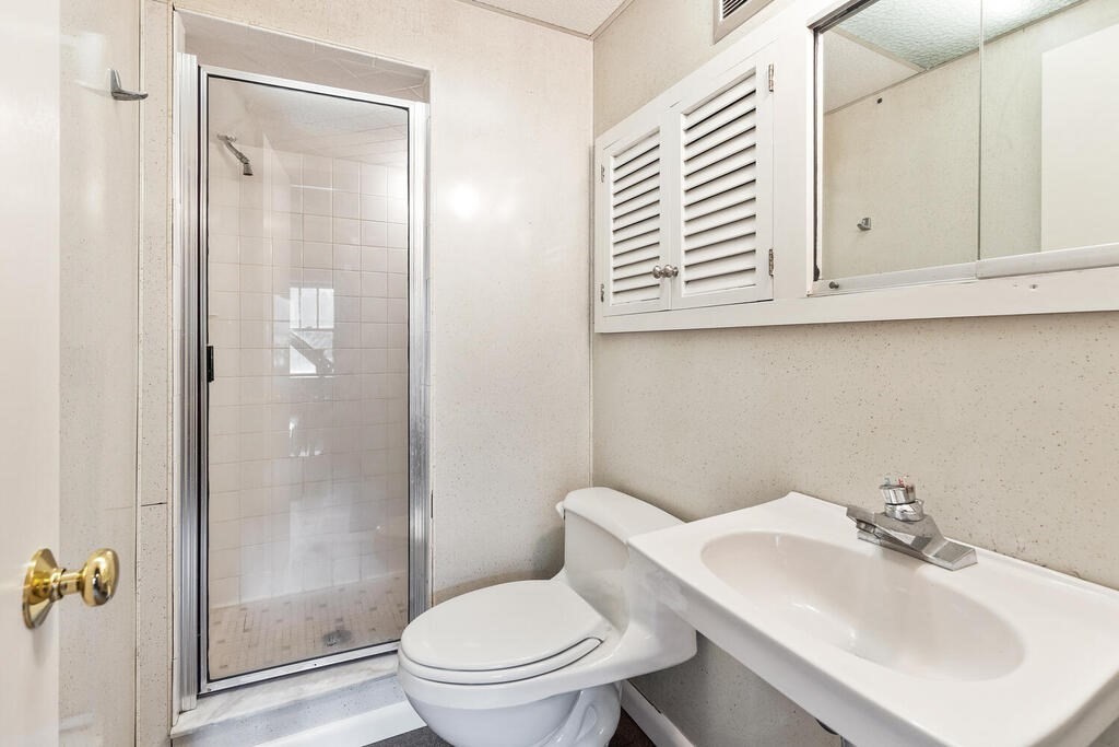 35 Brook Street Wakefield, MA 01880 - Photo 26 of 33 a bathroom with a sink toilet and shower