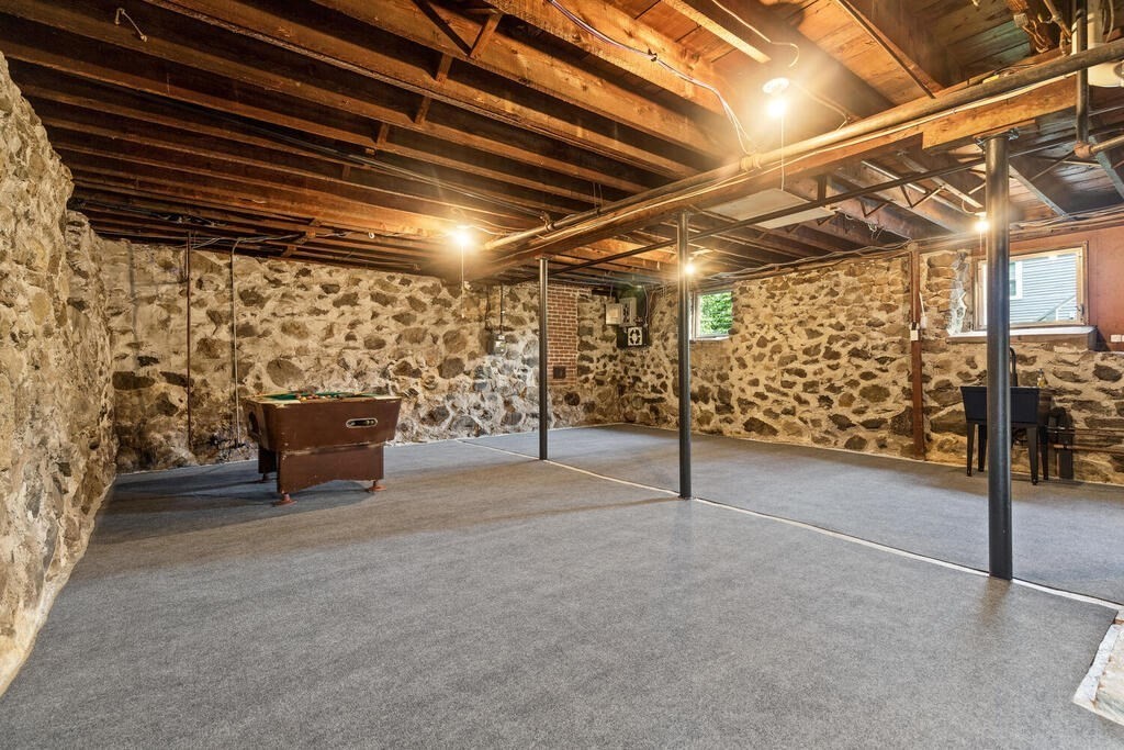 35 Brook Street Wakefield, MA 01880 - Photo 27 of 33 a view of empty room with wooden ceiling