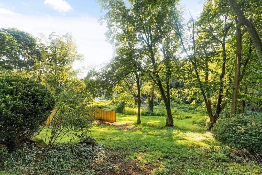 35 Brook Street Wakefield, MA 01880 - Photo 28 of 33 a backyard of building with trees