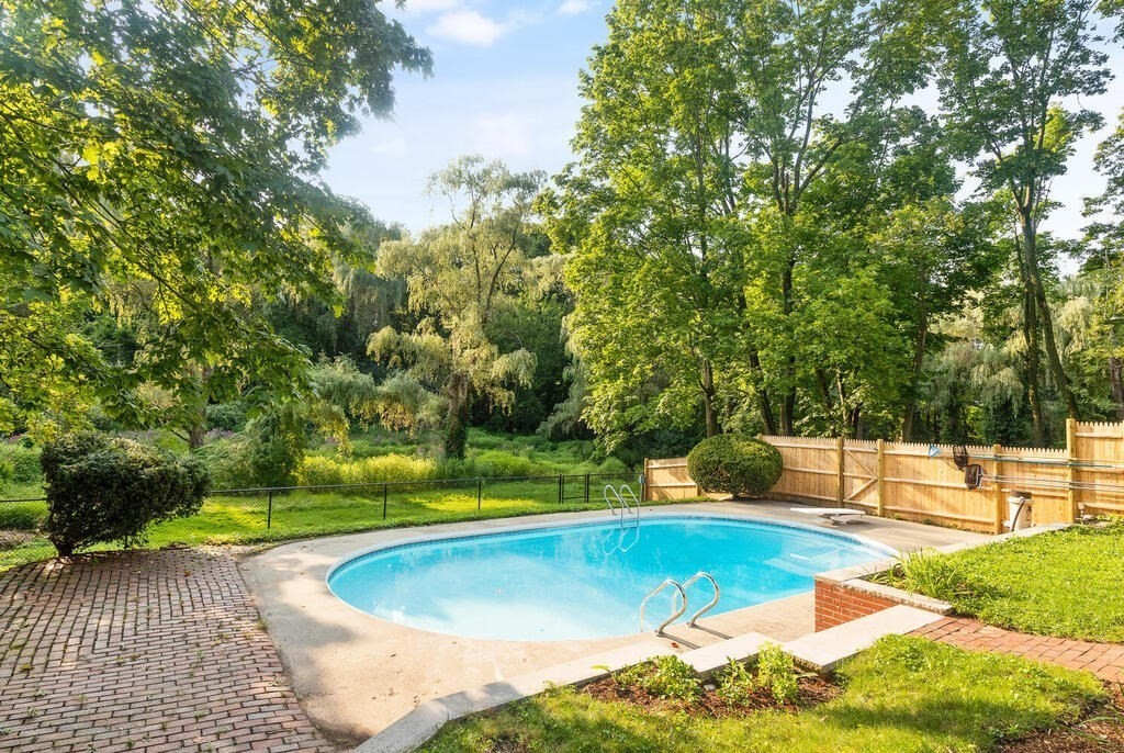 35 Brook Street Wakefield, MA 01880 - Photo 29 of 33 a view of a swimming pool with a patio
