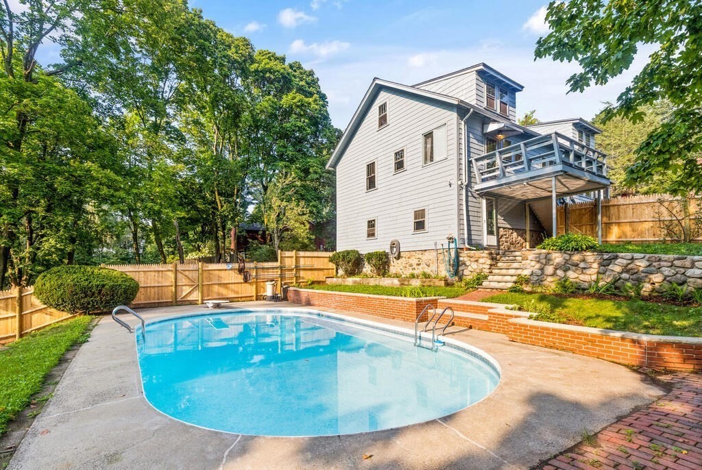 35 Brook Street Wakefield, MA 01880 - Photo 30 of 33 a view of a house with swimming pool and sitting area