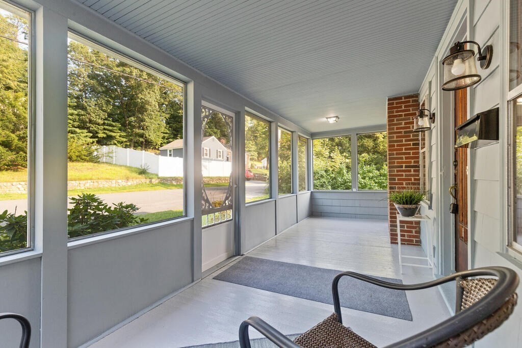 35 Brook Street Wakefield, MA 01880 - Photo 4 of 33 a living room with hardwood floor and large windows