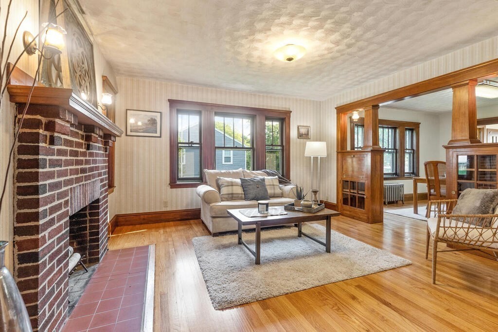 35 Brook Street Wakefield, MA 01880 - Photo 5 of 33 a living room with furniture and a rug