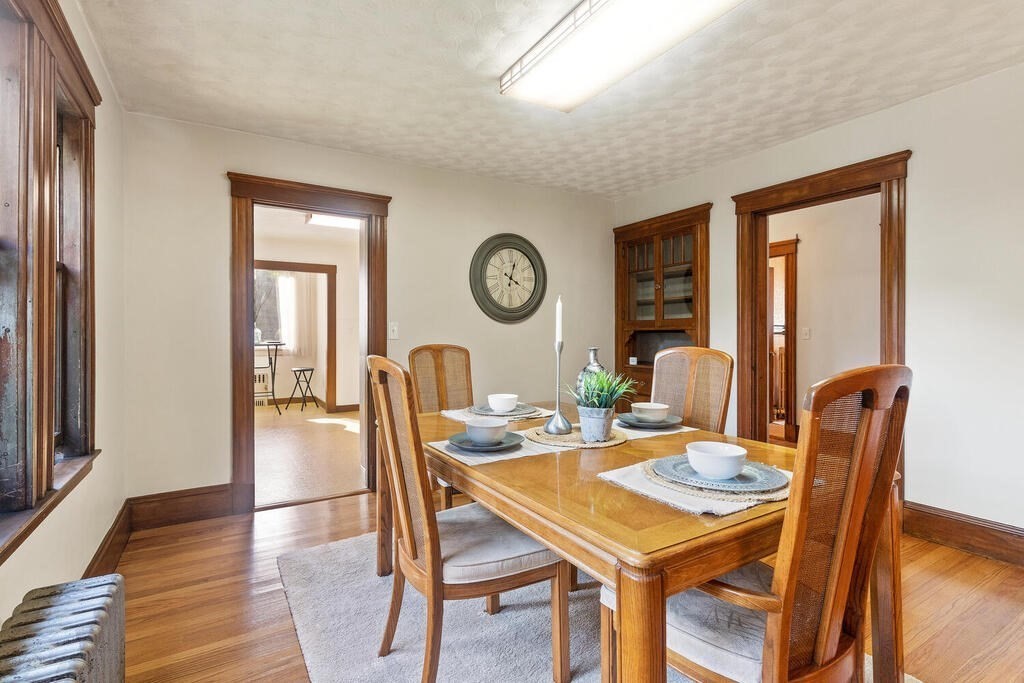 35 Brook Street Wakefield, MA 01880 - Photo 9 of 33 a view of a dining room with furniture and wooden floor